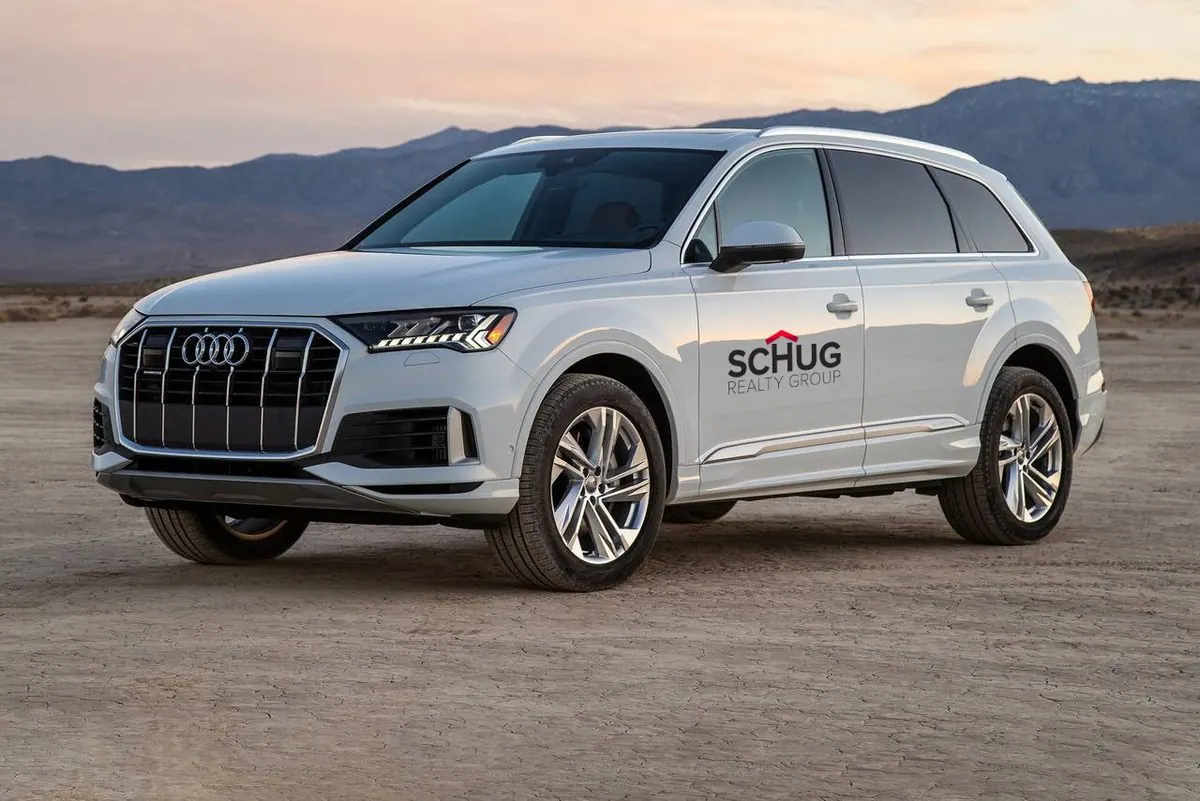 Schug Realty Group logo on Audi Q7